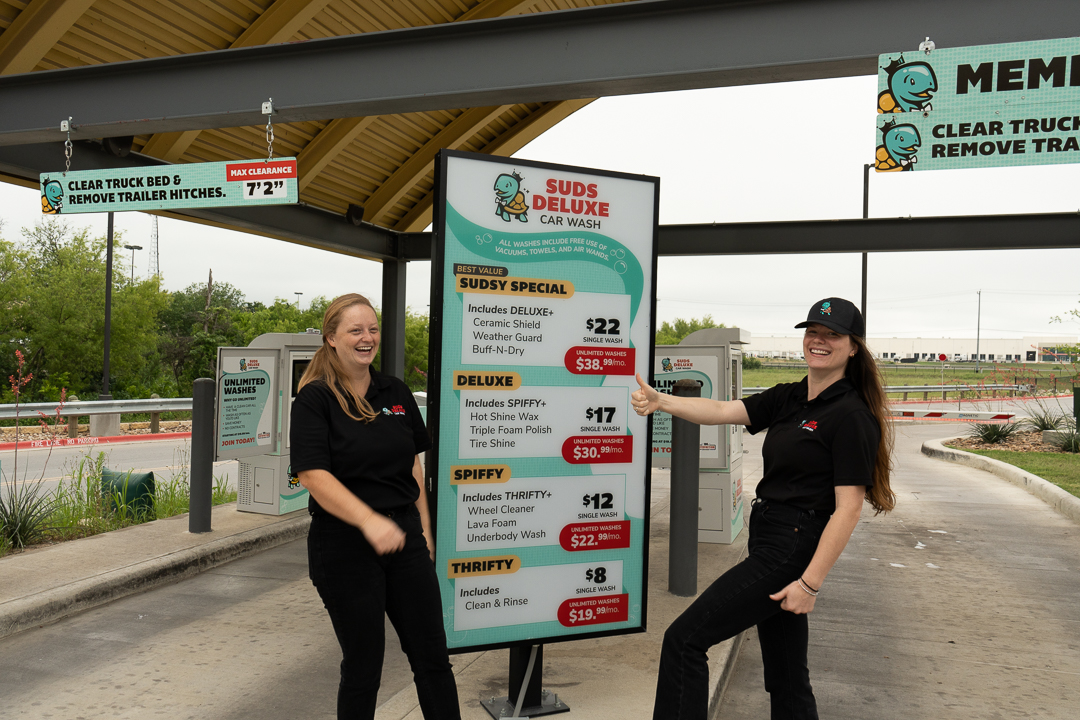 Suds Deluxe Team Members at Pay Stations