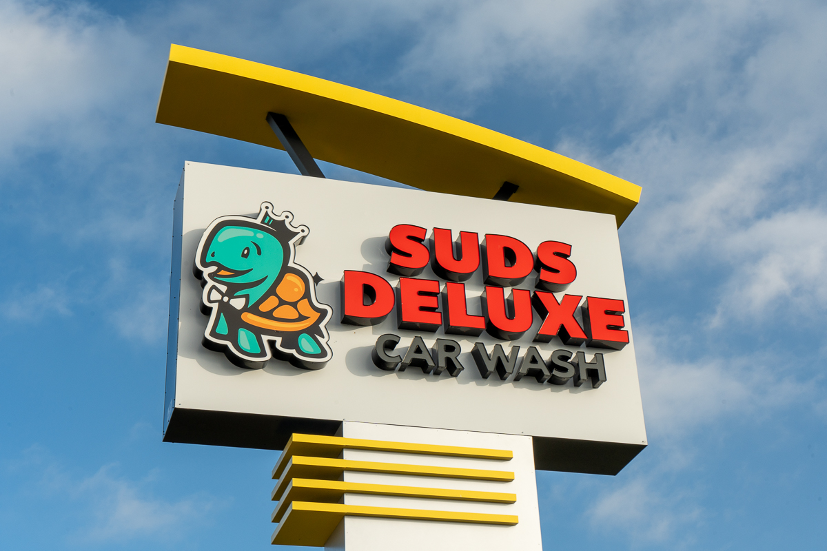 Suds Deluxe Car Wash San Marcos Wonder World Sign
