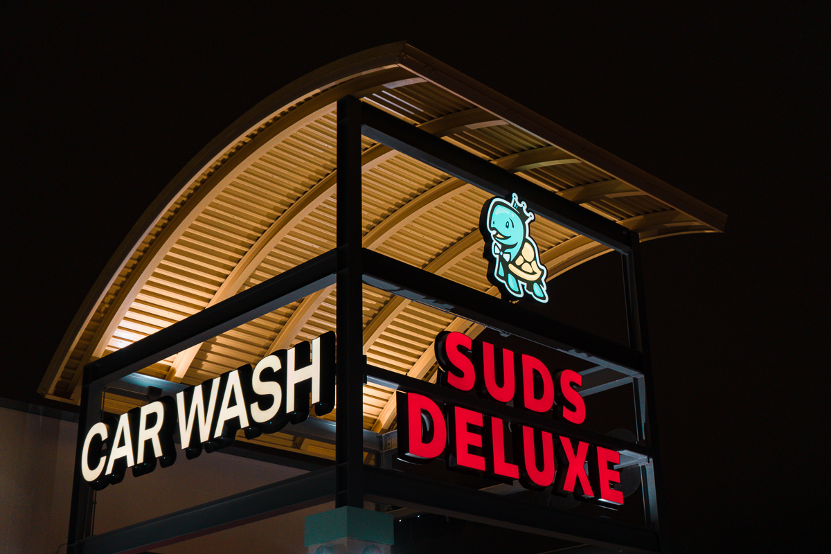 Suds Deluxe Car Wash Kyle Arch at Night